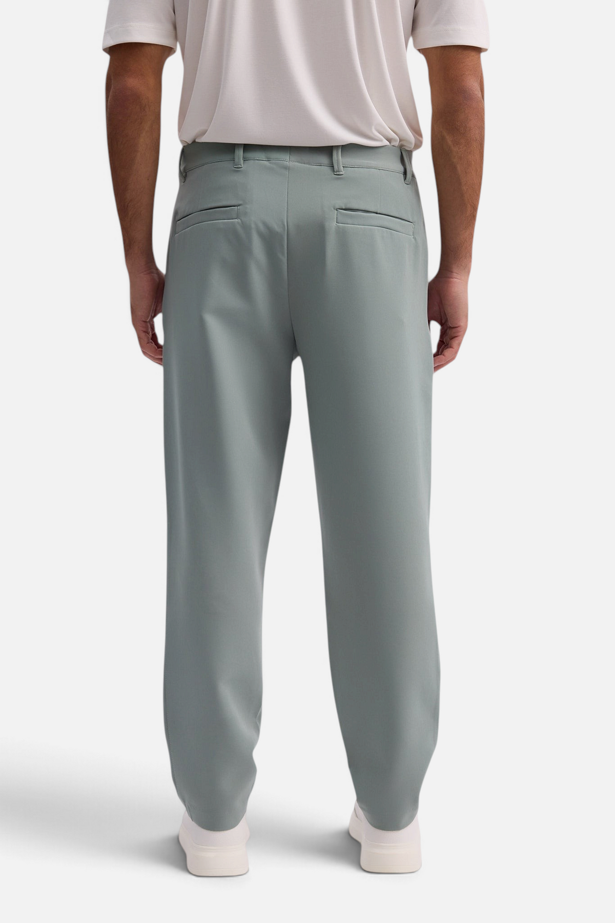 Mainstreamonline Santo Pants in sage green, featuring a relaxed wide-leg tailored fit viewed from the back.