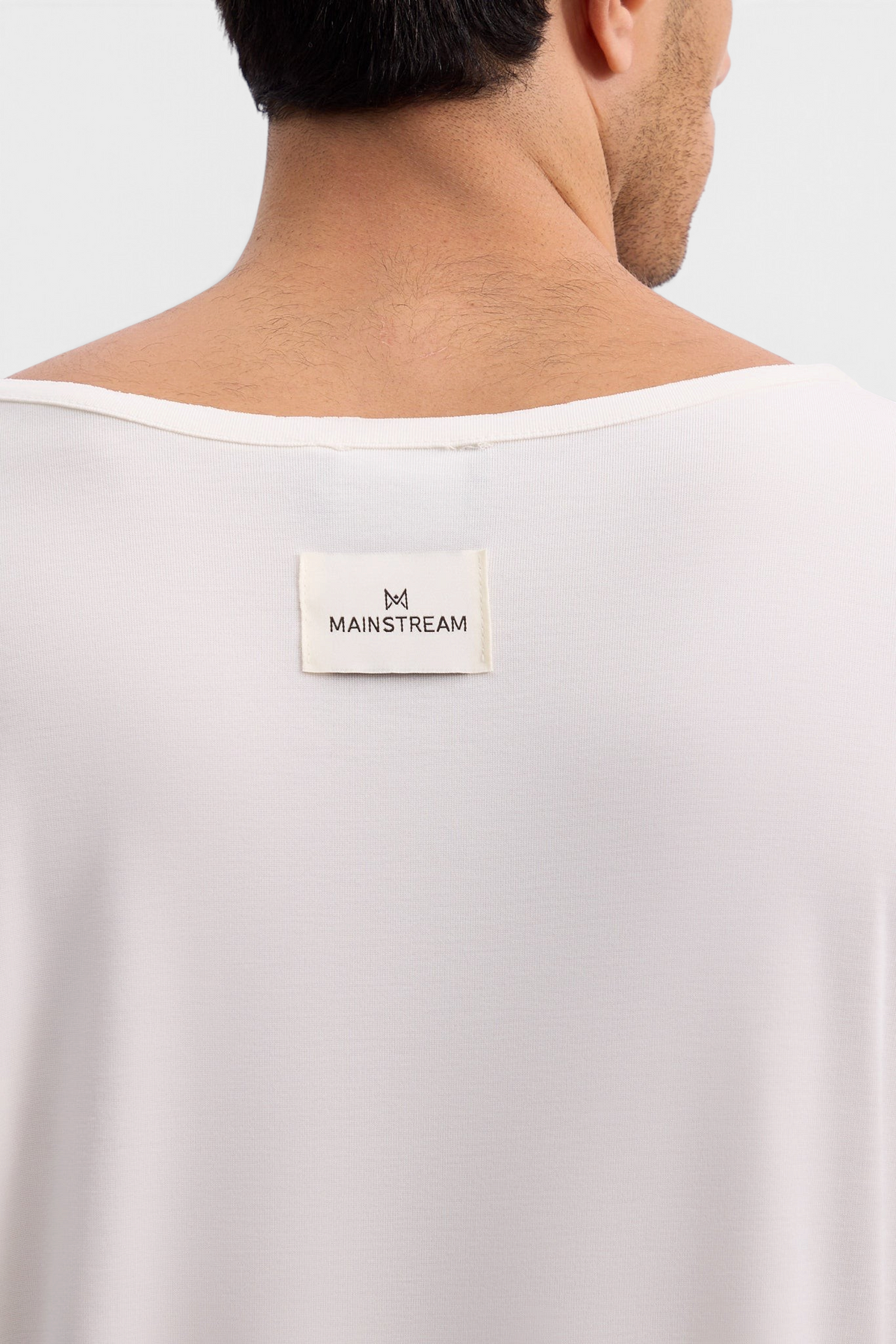 Mainstreamonline Niki long sleeve white oversized t-shirt with back neck logo label