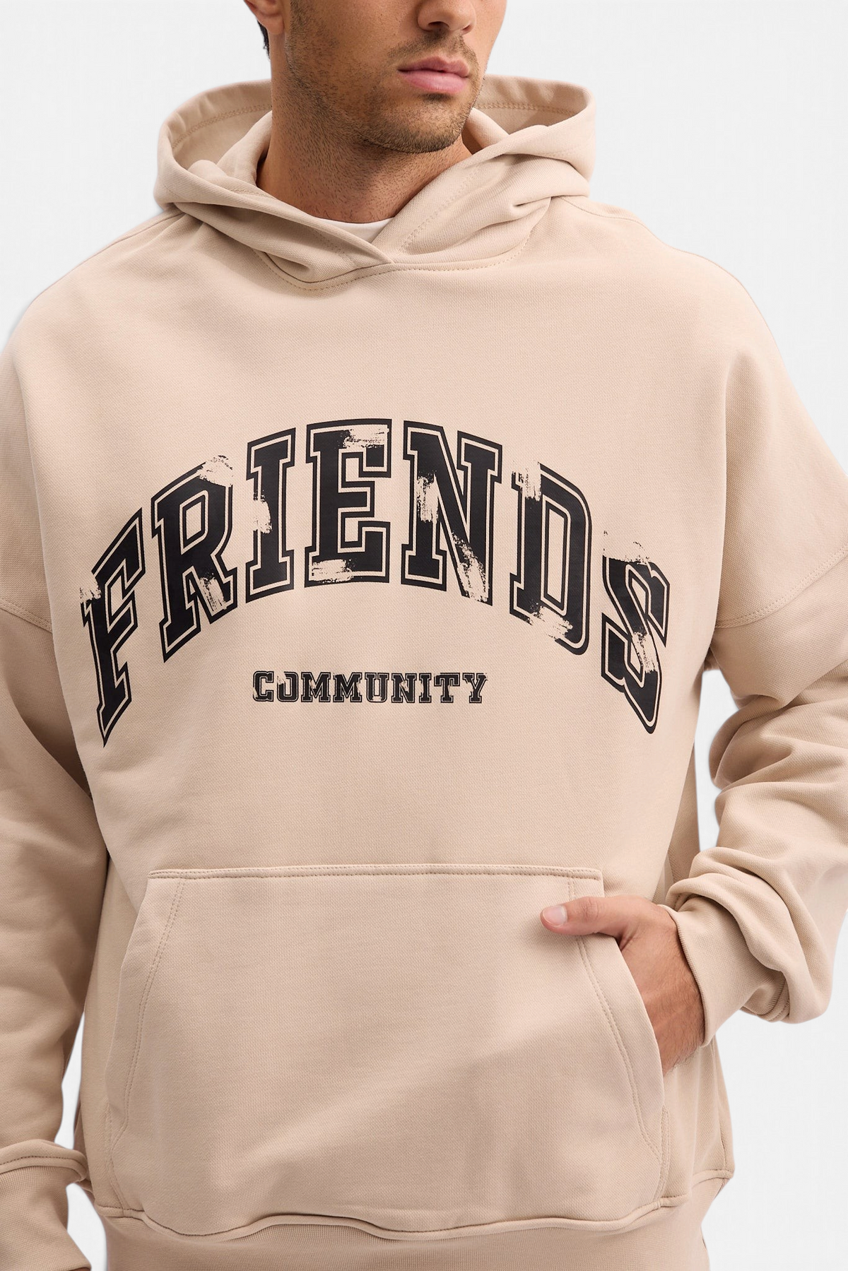 Mainstreamonline beige oversized hoodie with Friends Community graphic print and front kangaroo pocket