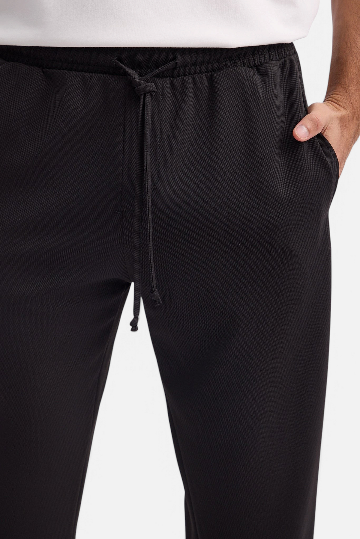 Mainstreamonline black casual Sol Pants with elastic waistband, drawstring, and side pockets in a relaxed fit