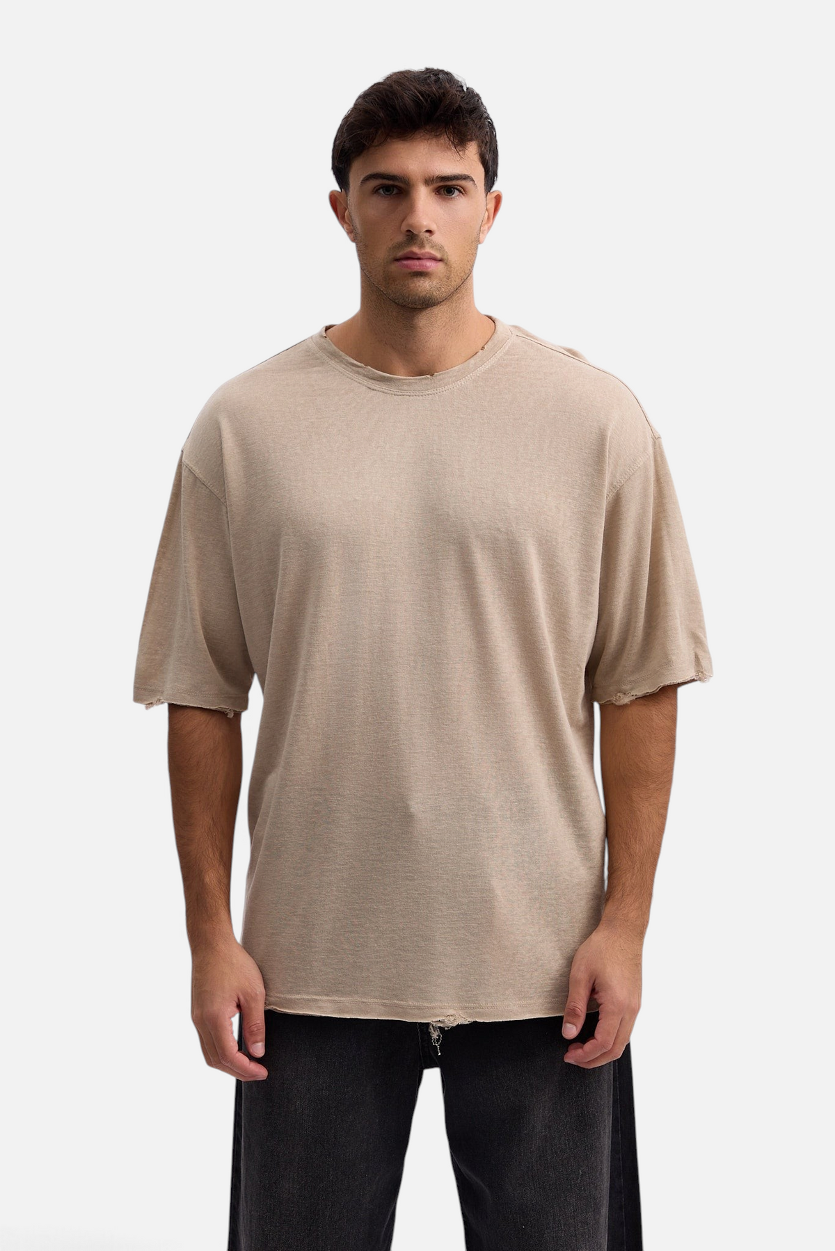 Mainstreamonline beige oversized linen slub t-shirt with raw hem details worn by a male model