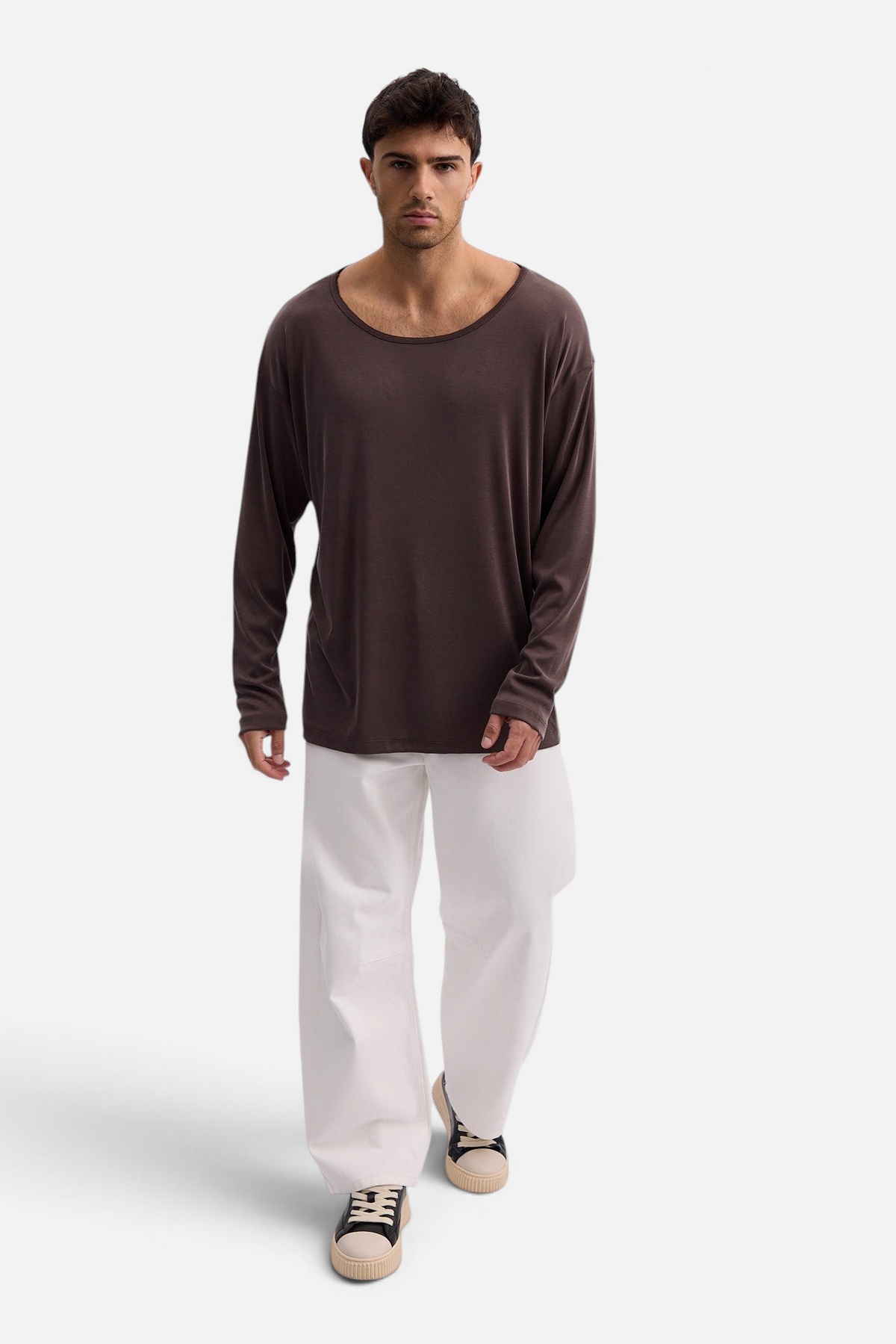 Mainstreamonline Niki long sleeve oversized brown t-shirt with a wide scoop neck worn by a male model