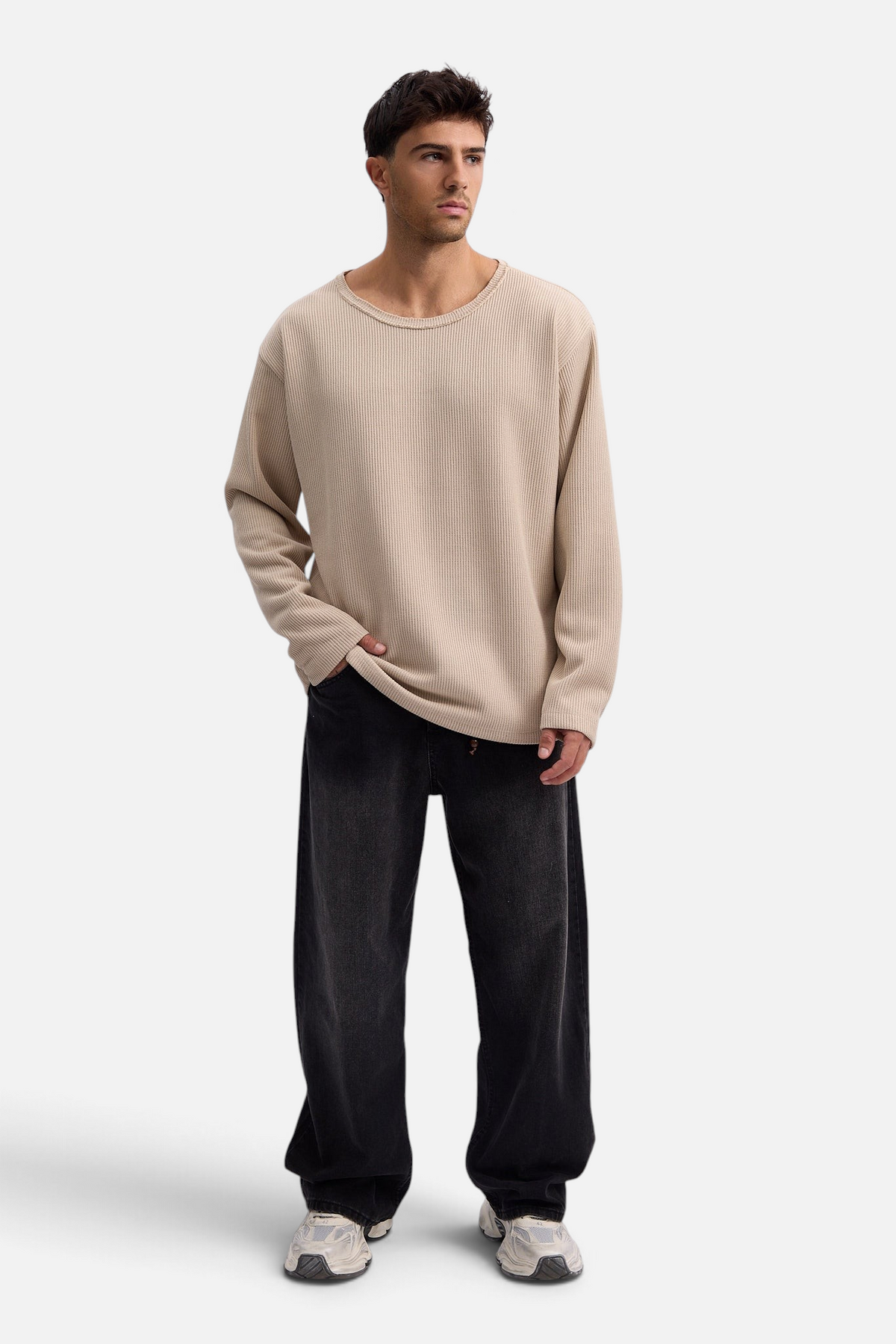 Mainstreamonline Sean Knit oversized beige long-sleeve sweater worn by a male model with black jeans