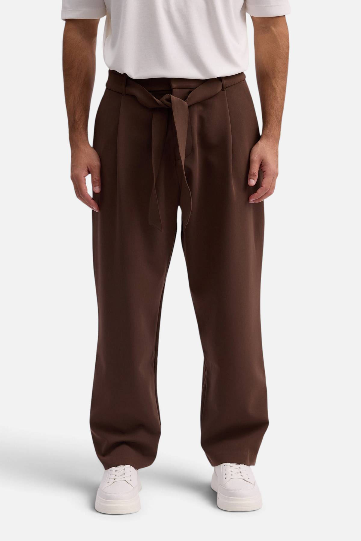 Mainstreamonline Torino wide-leg brown trousers with a tie-waist detail worn with a white t-shirt and sneakers