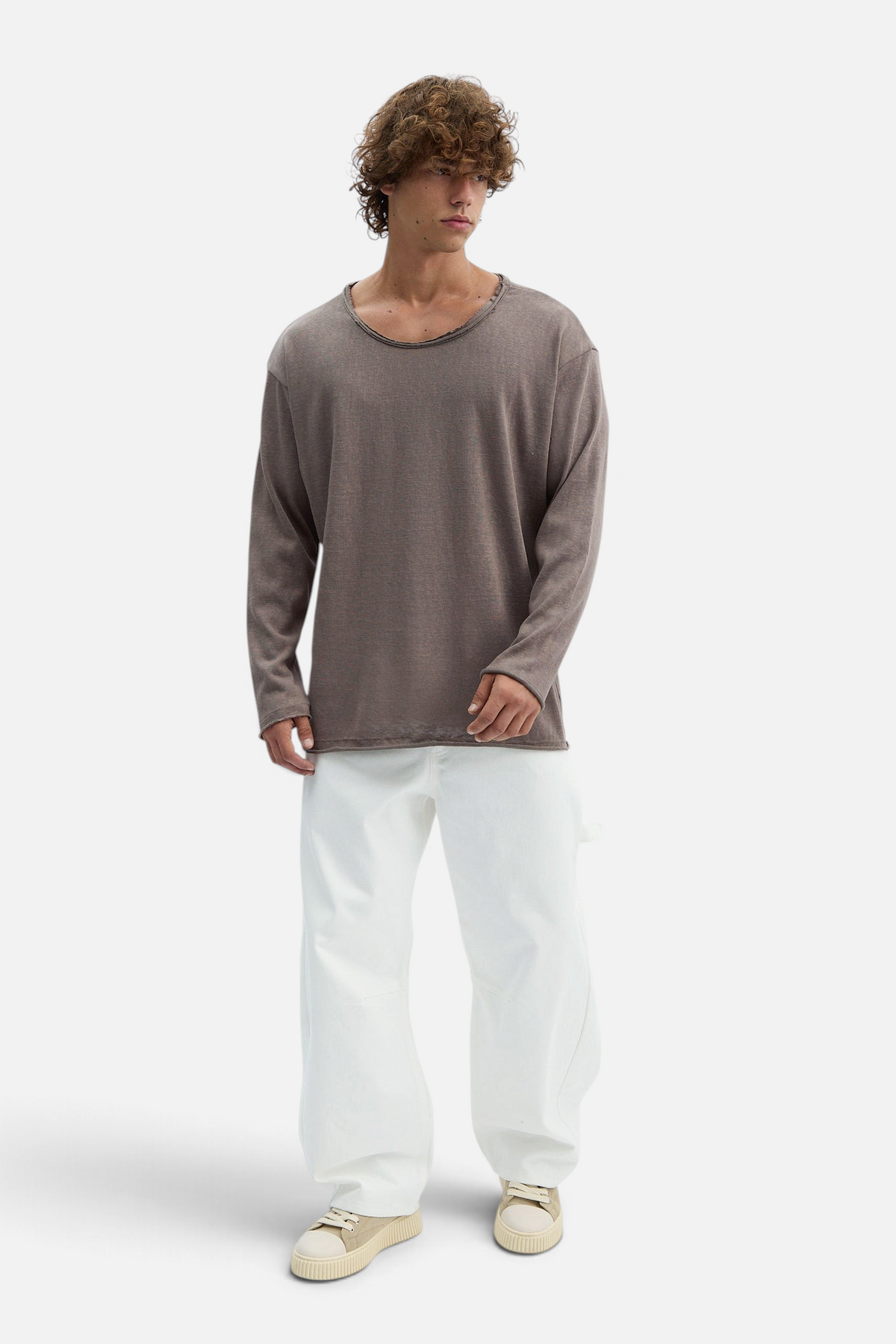 Mainstreamonline long sleeve oversized brown t-shirt with a distressed raw edge neckline worn by a male model
