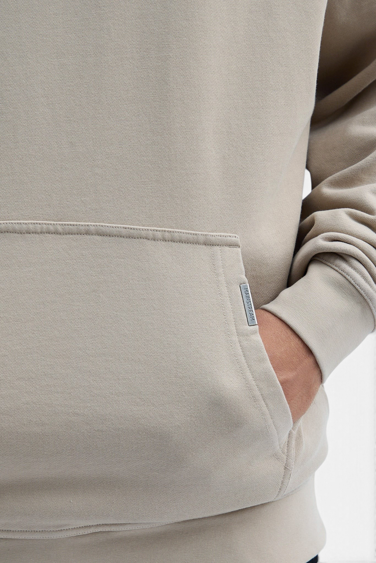 Mainstreamonline Luminous oversized hoodie in beige with a front kangaroo pocket and small brand label