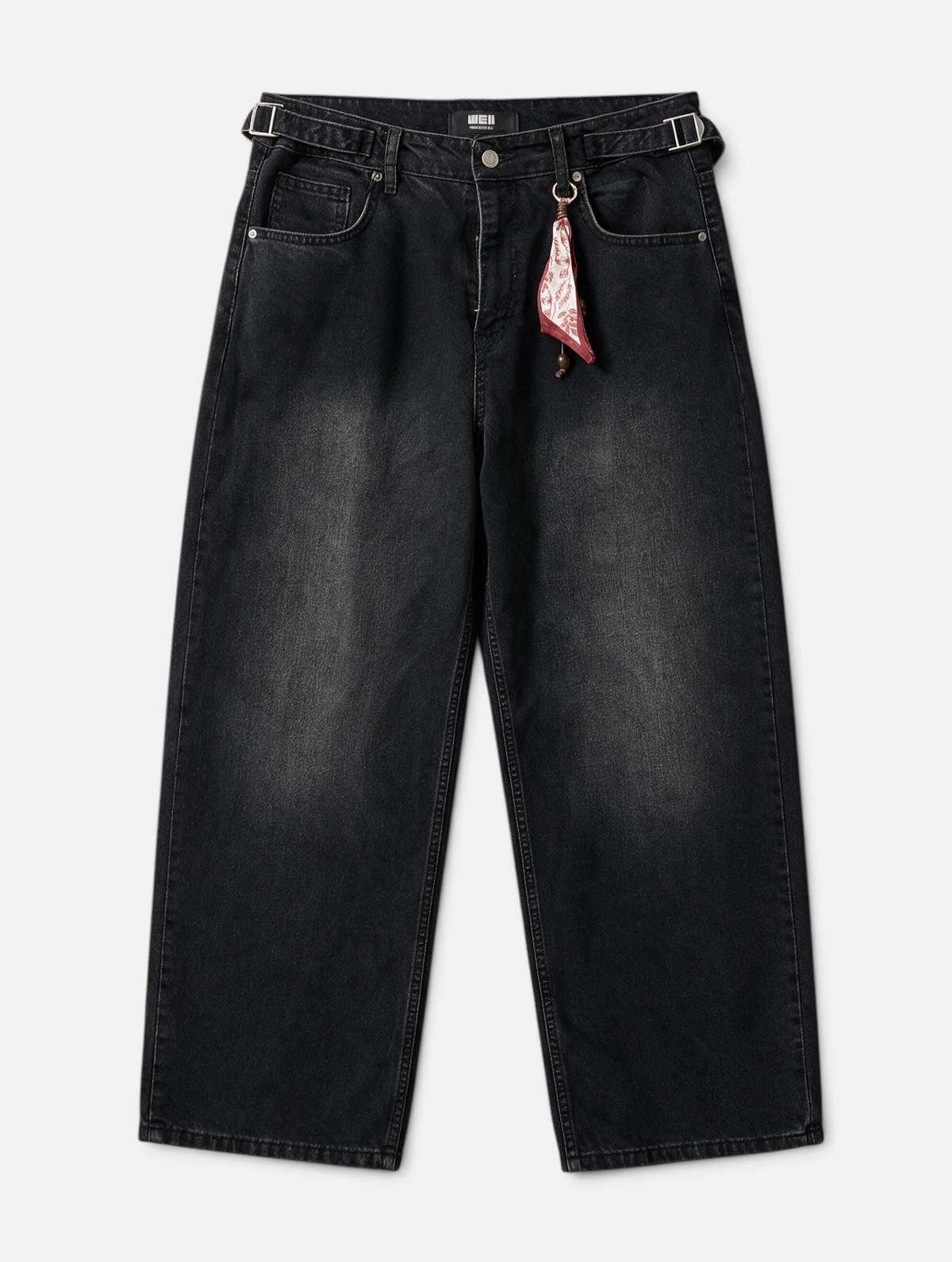 Mainstreamonline baggy skater jeans in washed black denim with side waist adjusters and a small decorative bandana