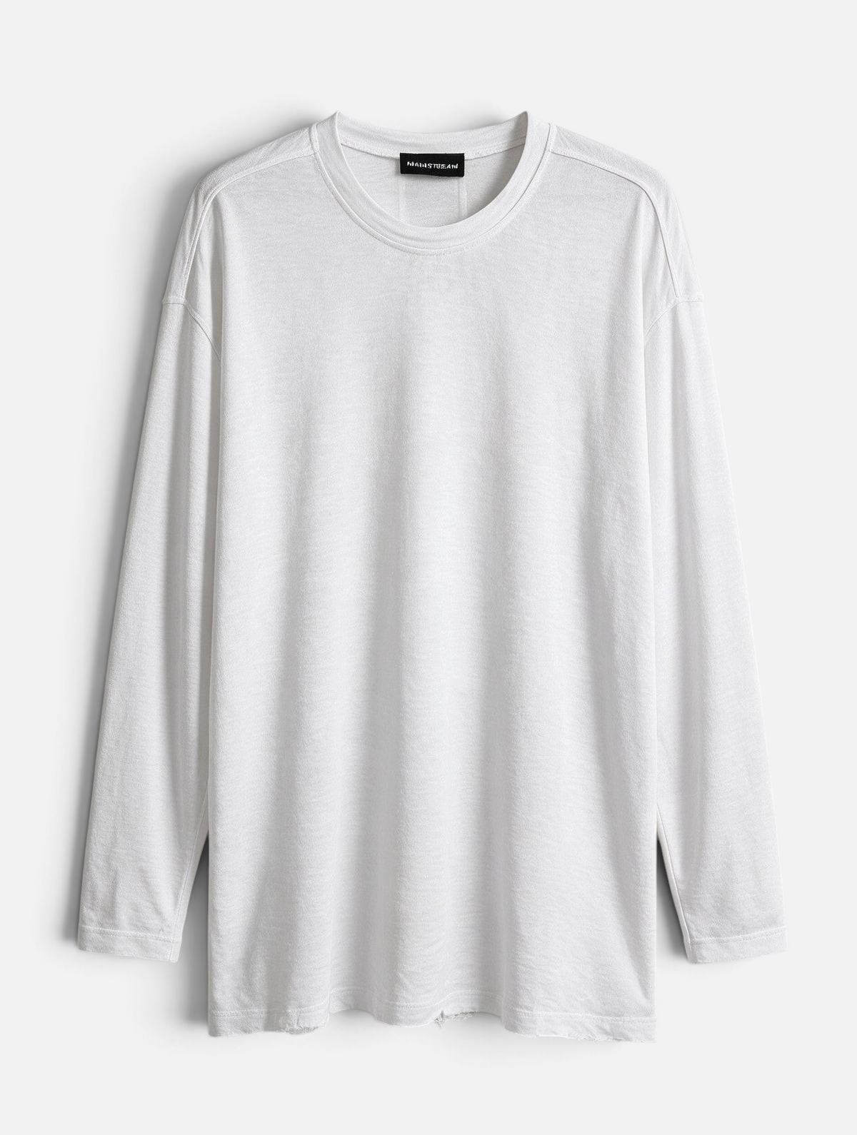 Mainstreamonline white linen long sleeve t-shirt with a relaxed oversized fit and raw hem detail