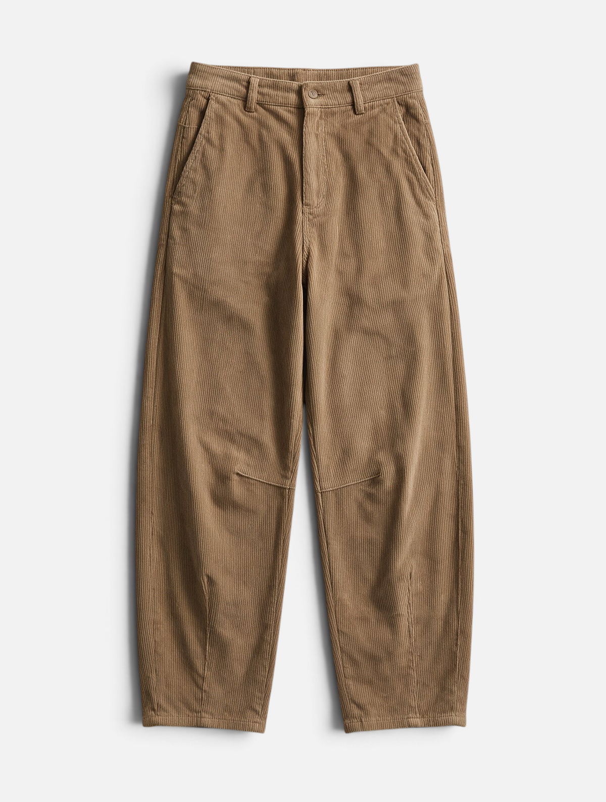 Mainstreamonline beige corduroy baggy pants with a loose fit and textured fabric on a plain background.