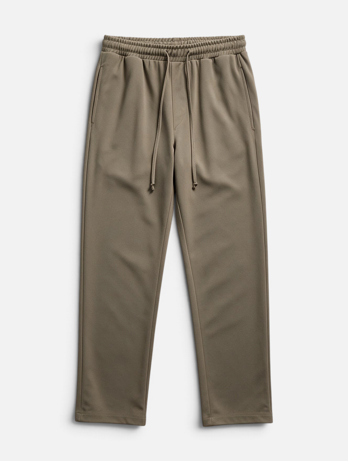 Mainstreamonline Sol Pants in taupe featuring a relaxed straight-leg fit, elastic waistband, and drawstring closure.
