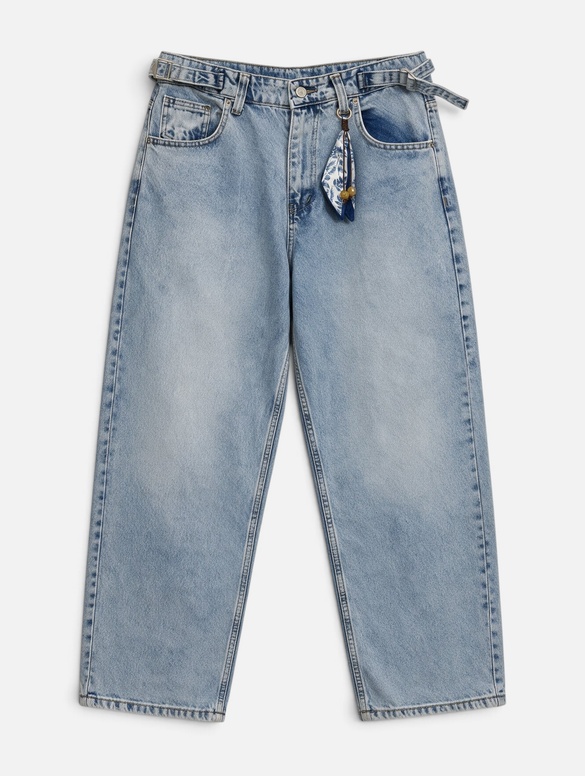 Mainstreamonline light wash baggy skater jeans with a relaxed wide-leg fit and a decorative waist scarf detail.