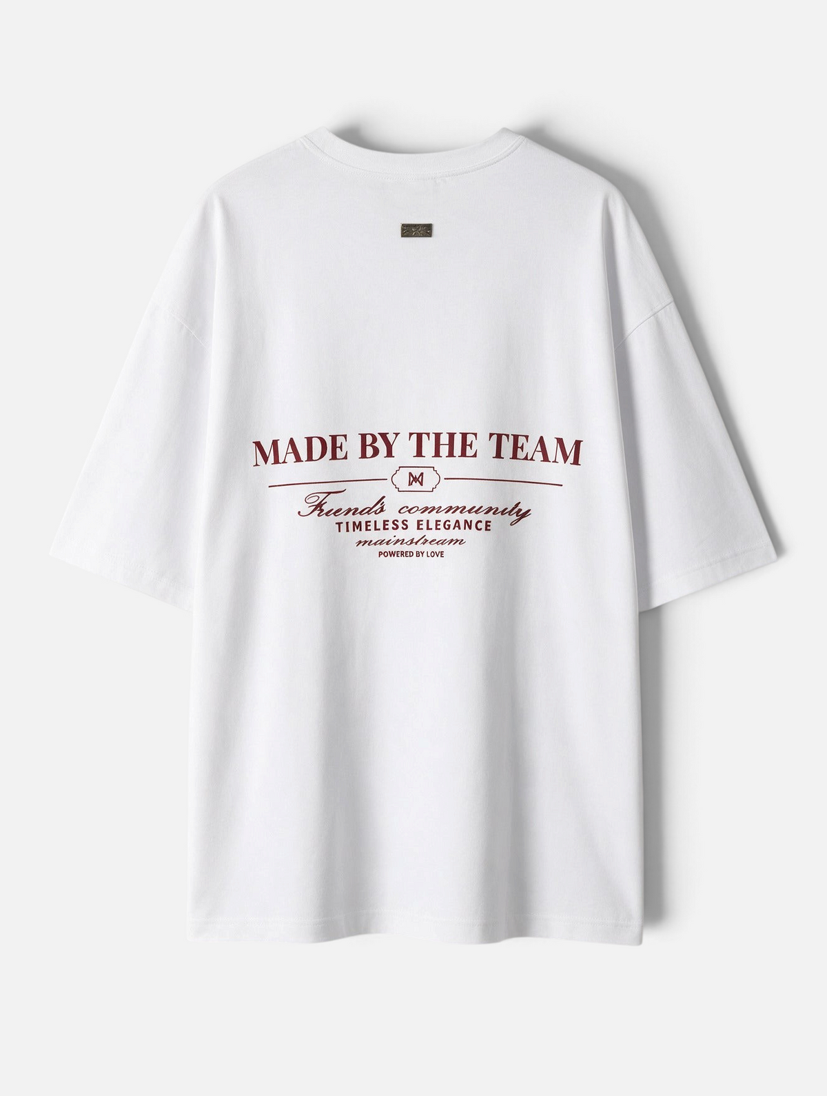 Mainstreamonline white oversized t-shirt with maroon graphic print on the back and small brand logo tag at the neck