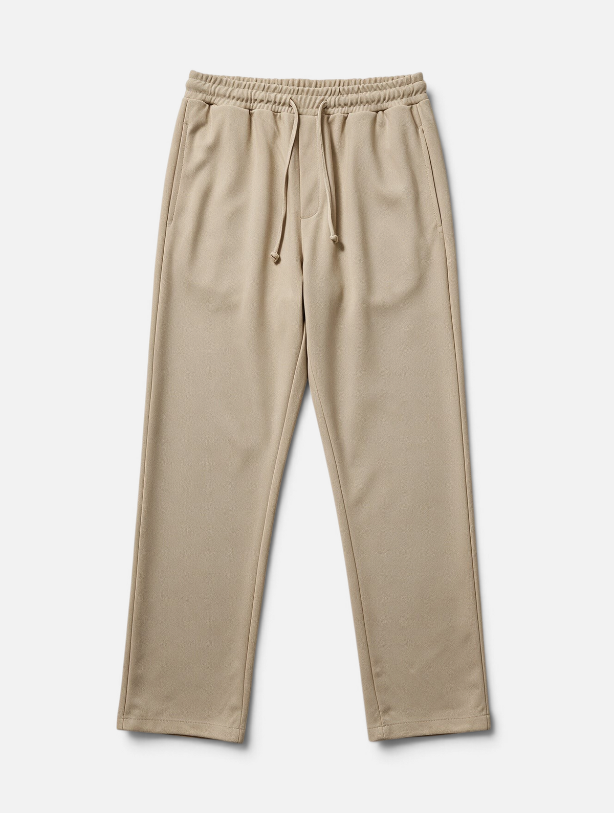 Mainstreamonline Sol Pants in beige featuring a relaxed straight-leg fit, elastic waistband, and drawstring closure.