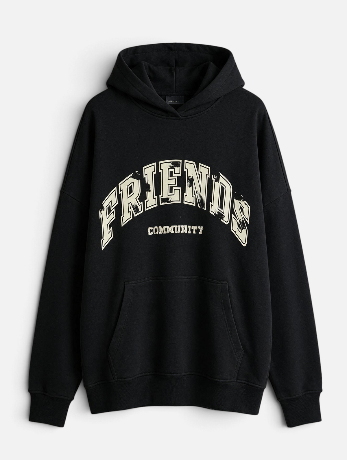 Mainstreamonline black oversized hoodie featuring a distressed white Friends Community graphic print and front pocket