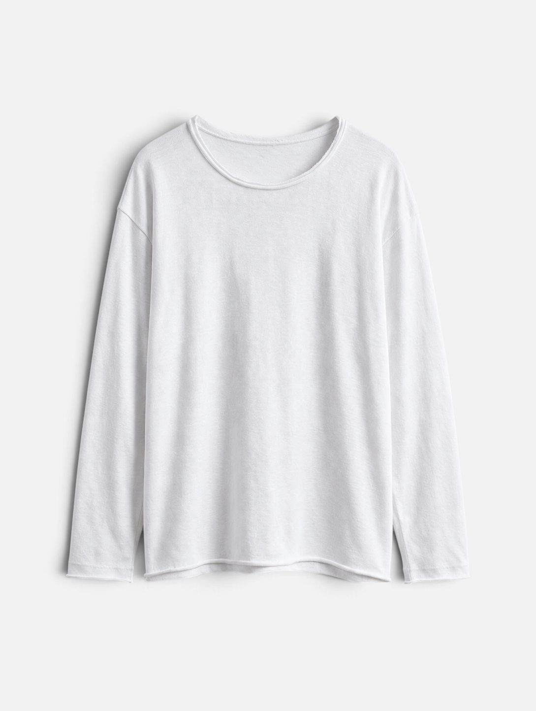 Mainstreamonline white long sleeve oversized Bali t-shirt with a relaxed fit and raw edge neckline