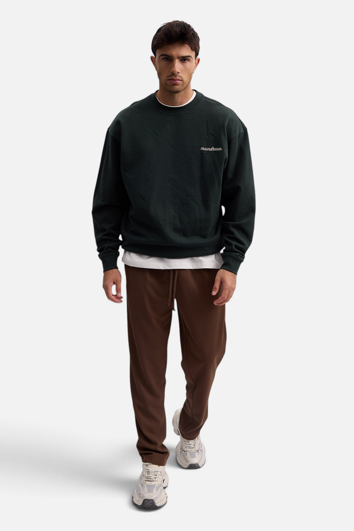 Mainstreamonline Sol Pants in brown with a relaxed straight fit, elastic waistband, and drawstring detail.