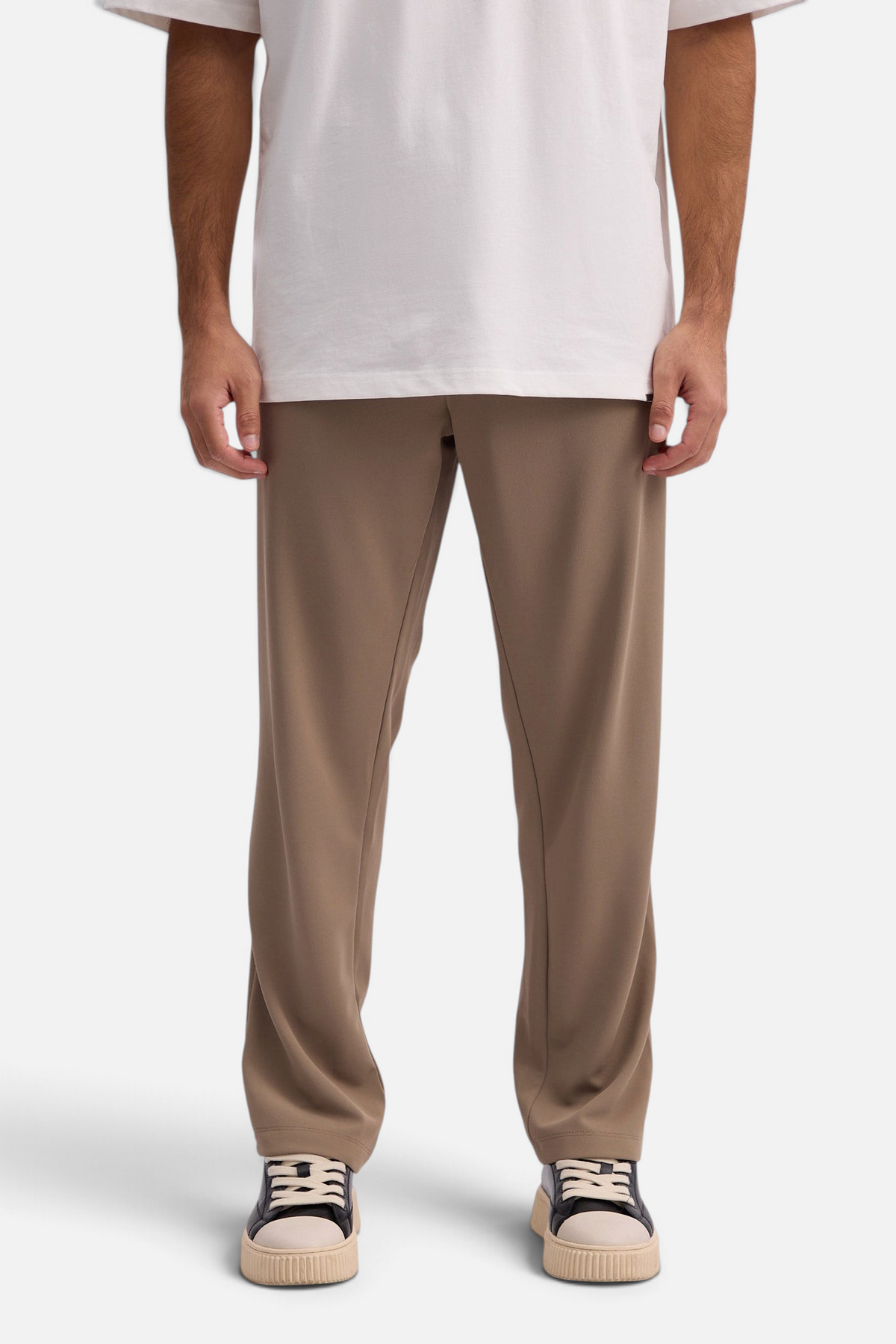 Mainstreamonline Sol Pants in taupe featuring a relaxed straight-leg fit, elastic waistband, and side pockets.