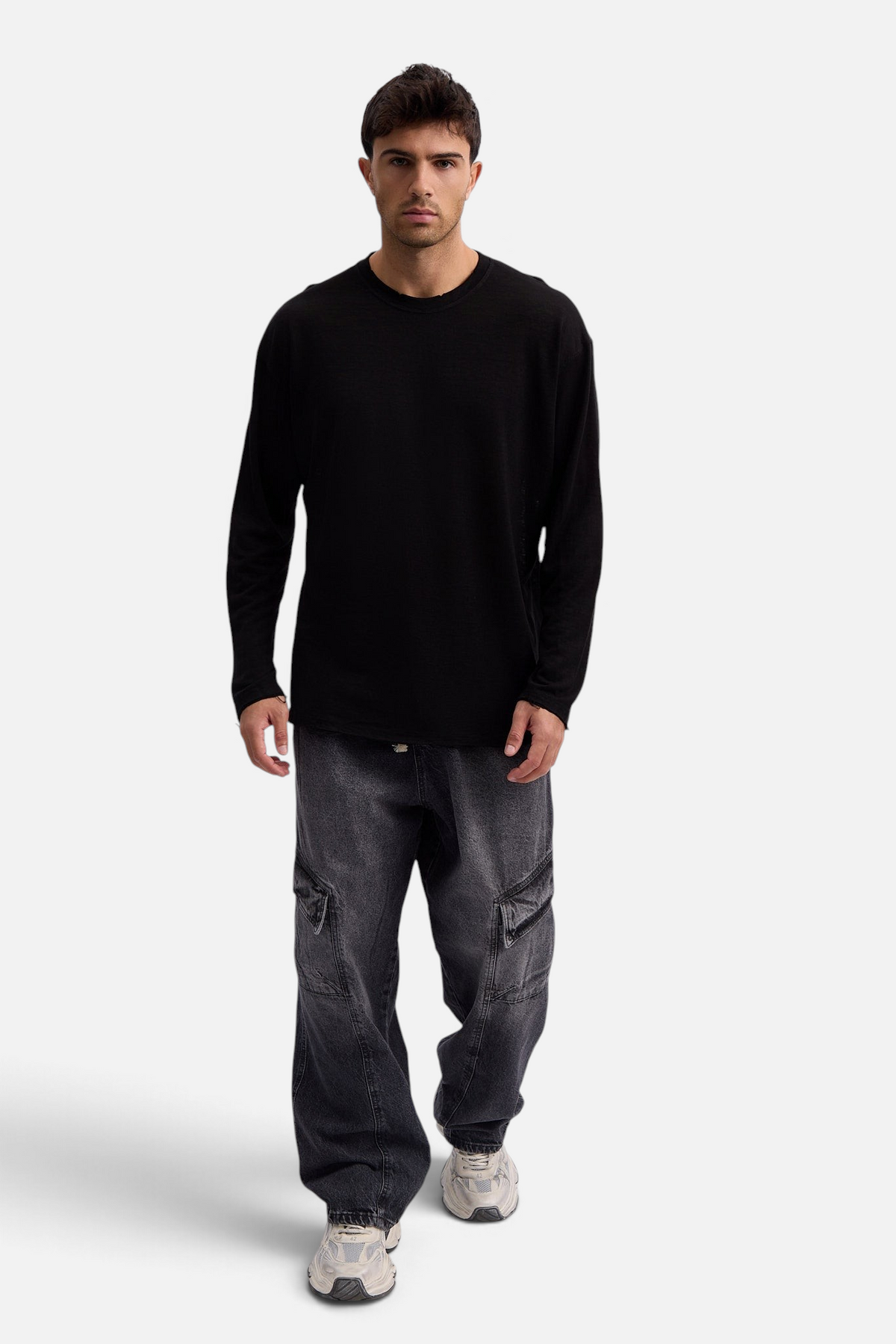 Mainstreamonline black long sleeve linen slub t-shirt in an oversized fit worn by a male model