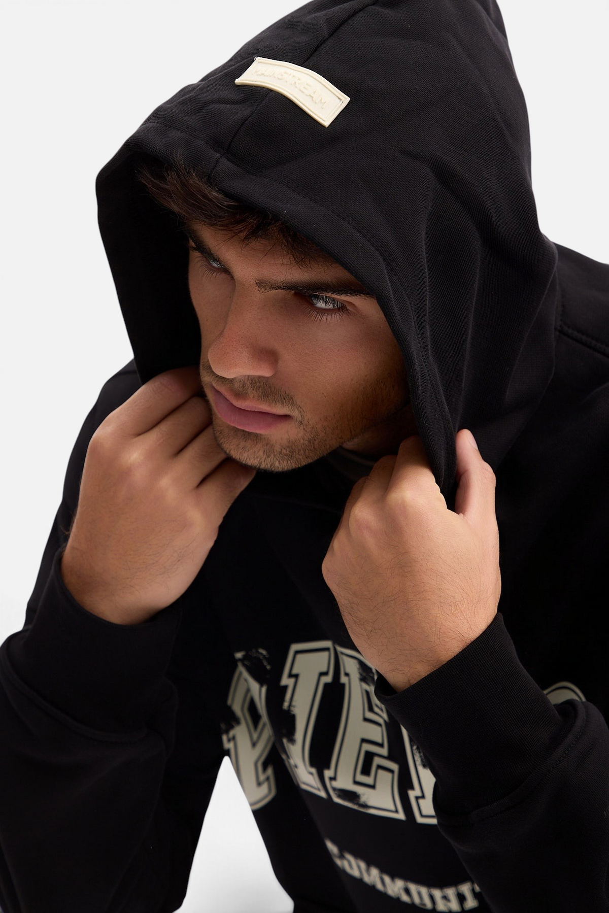 Mainstreamonline black oversized Social Club hoodie with a relaxed fit and branded patch on the hood