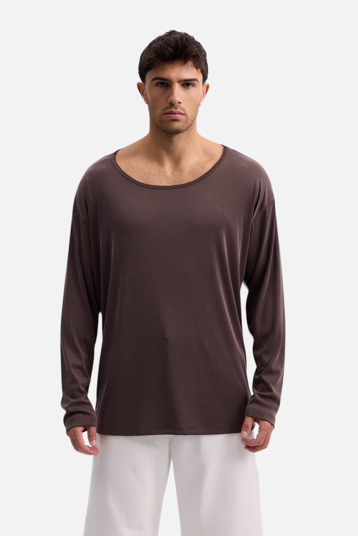 Mainstreamonline Niki long sleeve oversized brown t-shirt with a wide scoop neck worn by a male model