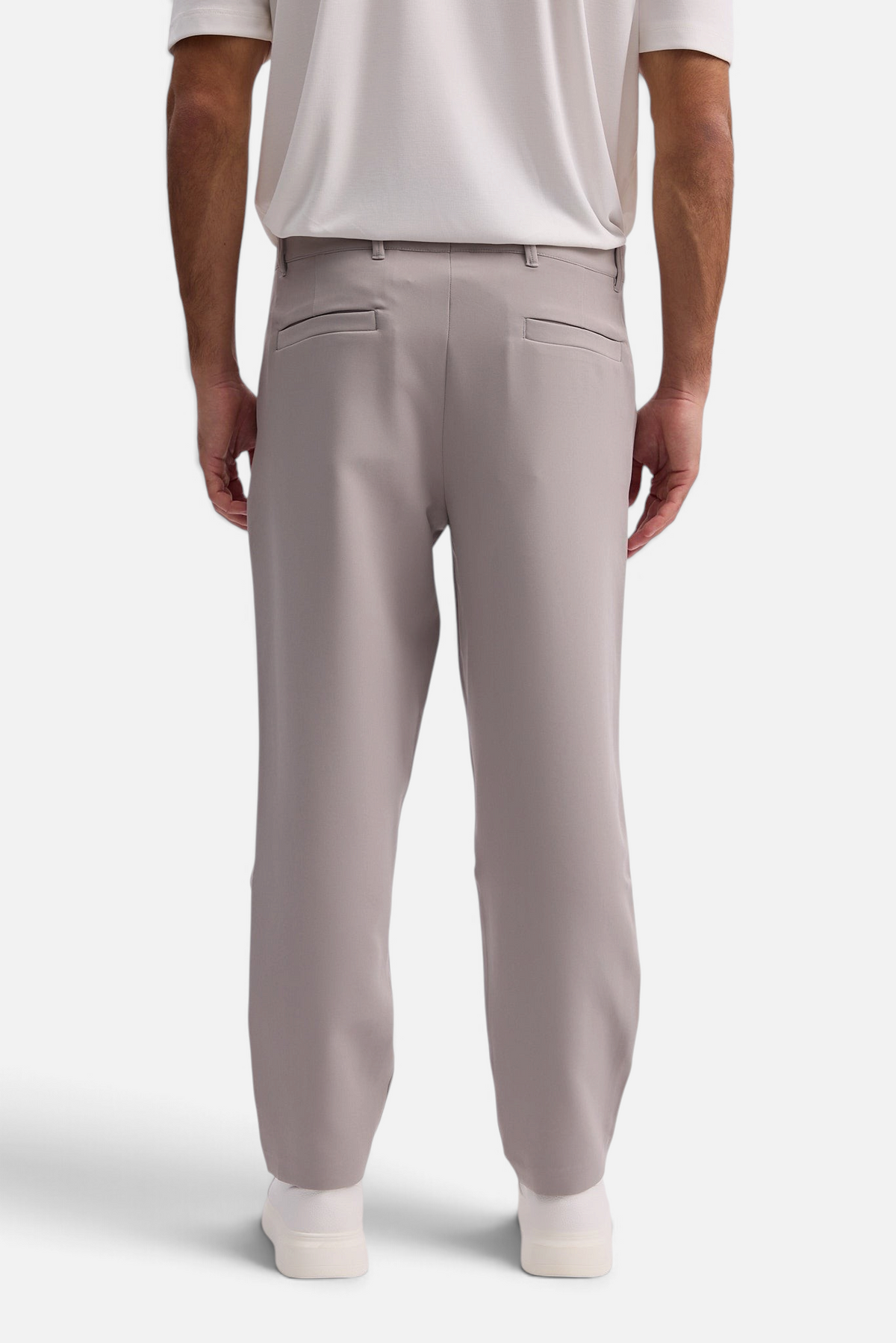 Mainstreamonline Santo Pants in light grey, featuring a relaxed wide-leg tailored fit viewed from the back.