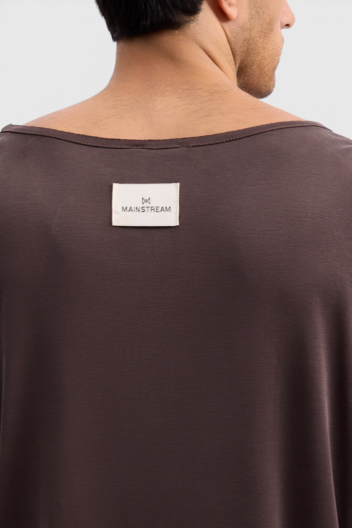 Mainstreamonline Niki long sleeve oversized brown t-shirt with a branded neck label on the back