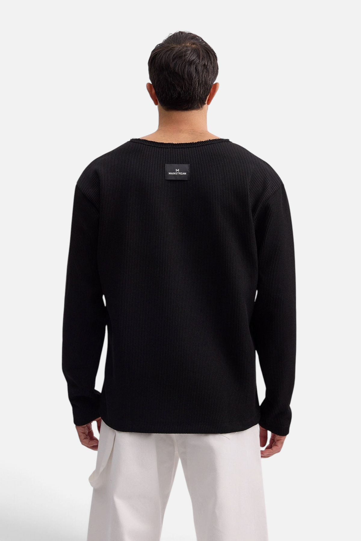 Mainstreamonline Sean Knit black oversized long-sleeve sweater with ribbed texture and back logo patch