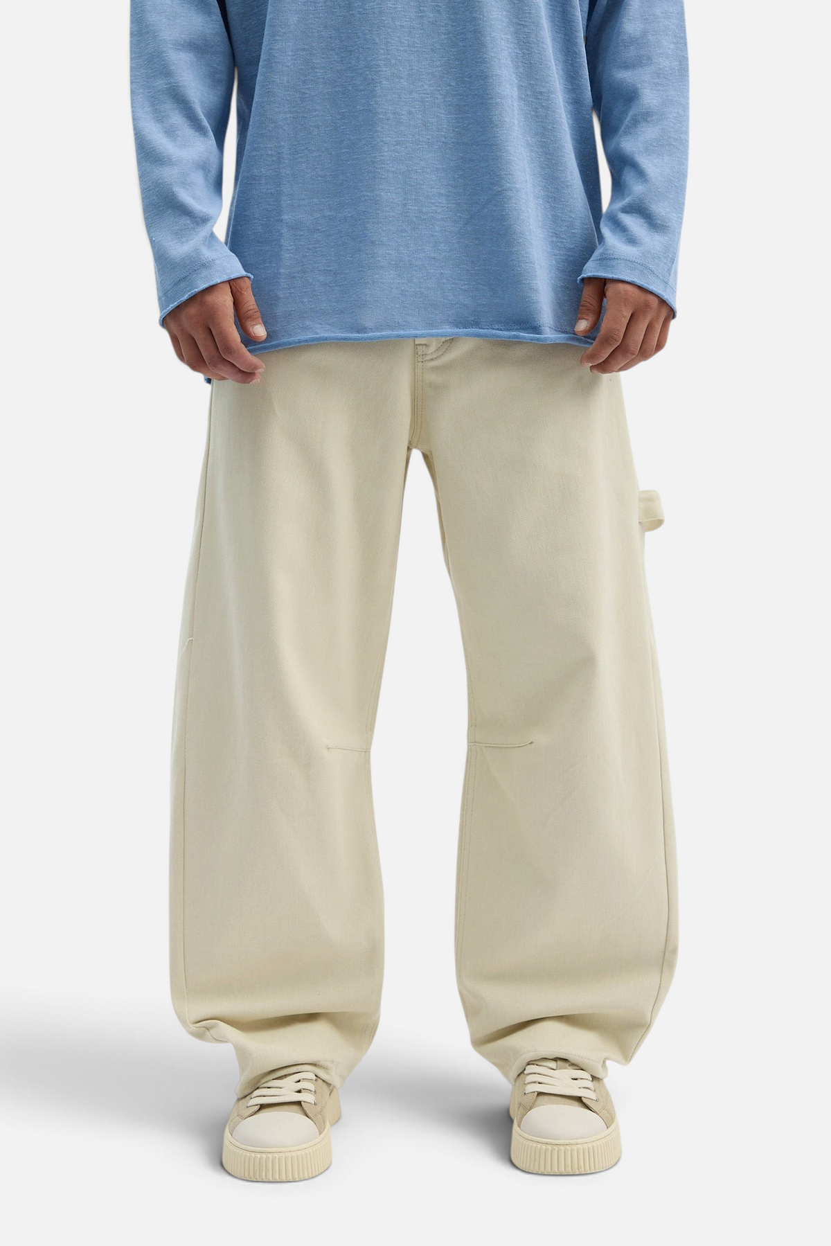 Mainstreamonline loose-fit beige drill pants with a relaxed wide-leg cut worn by a model